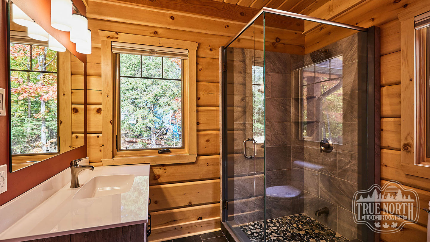 Arrowhead two-storey Canadian log home with cathedral ceilings and floor-to-ceiling windows - Shower Room