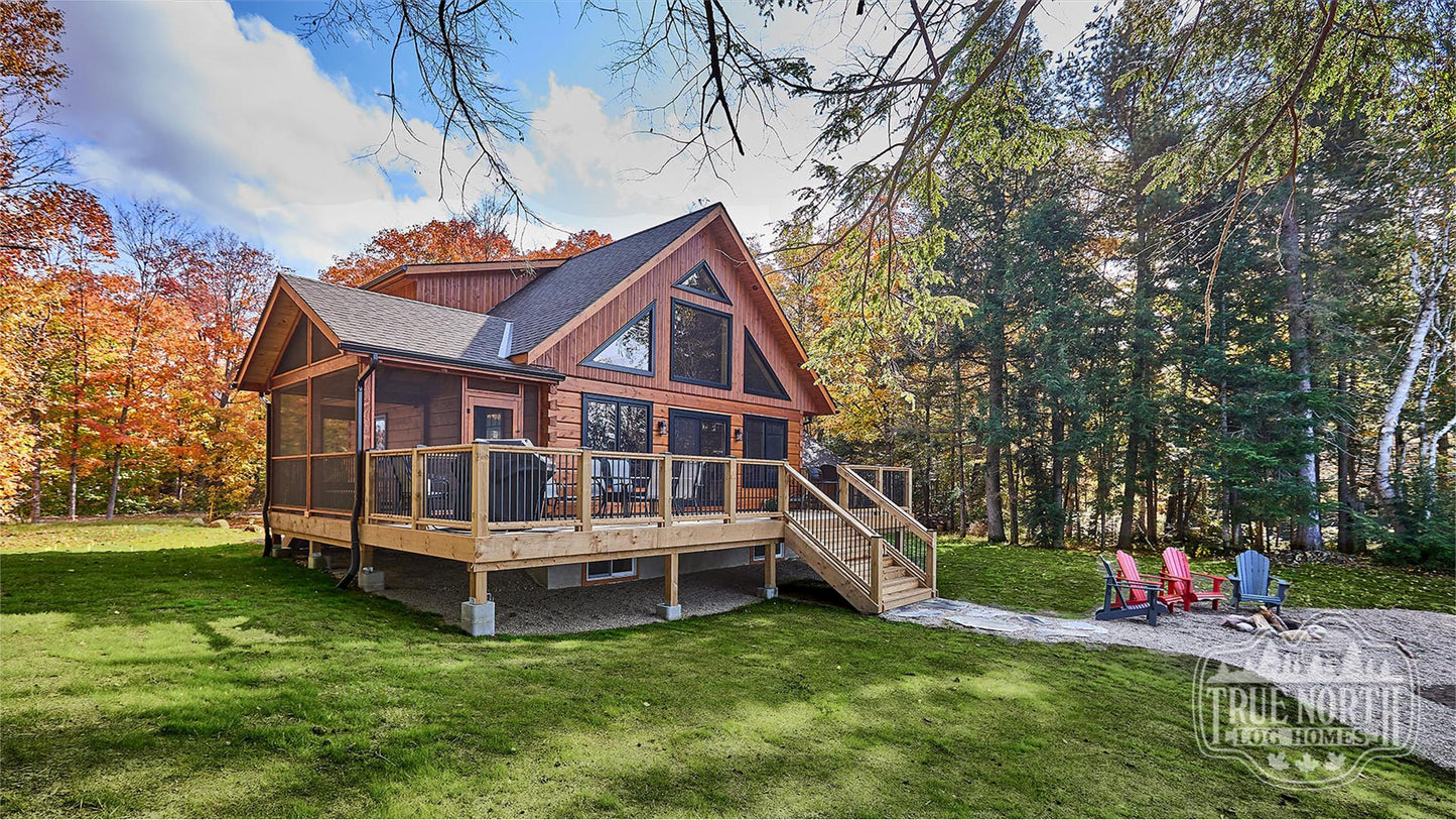 Arrowhead two-storey Canadian log home with cathedral ceilings and floor-to-ceiling windows - Wide Shot of Front
