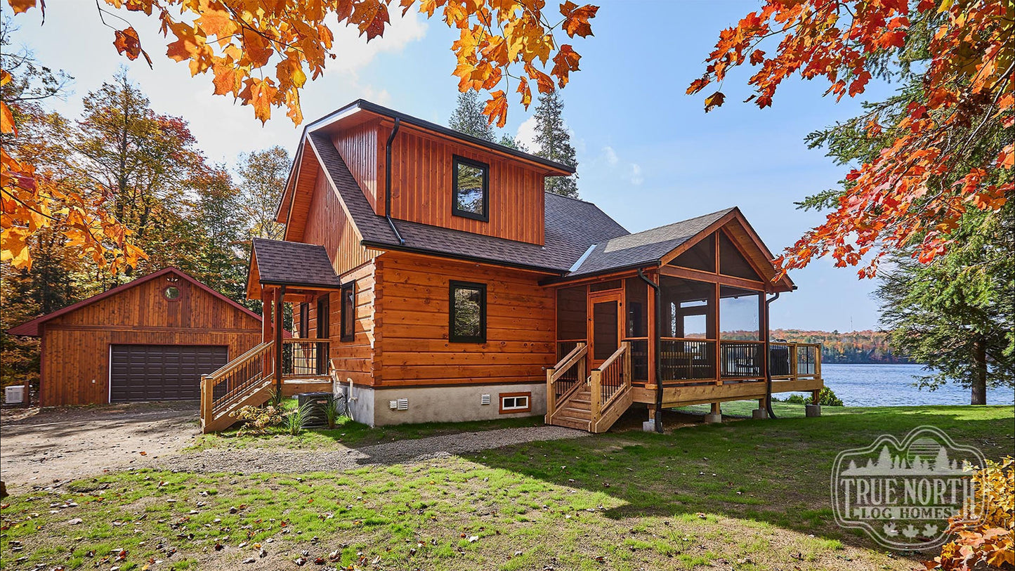 Arrowhead two-storey Canadian log home with cathedral ceilings and floor-to-ceiling windows - Side and Rear facing lake