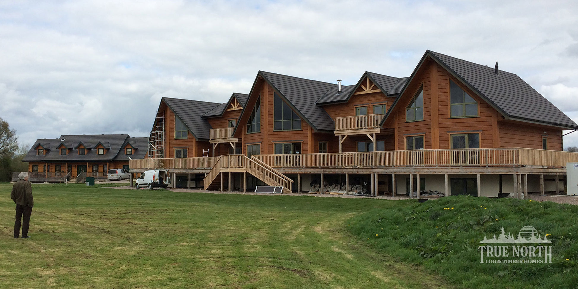 Alaskan commercial Canadian log building built for Foundation Matters charity - Alaskan and Louisburg side by side