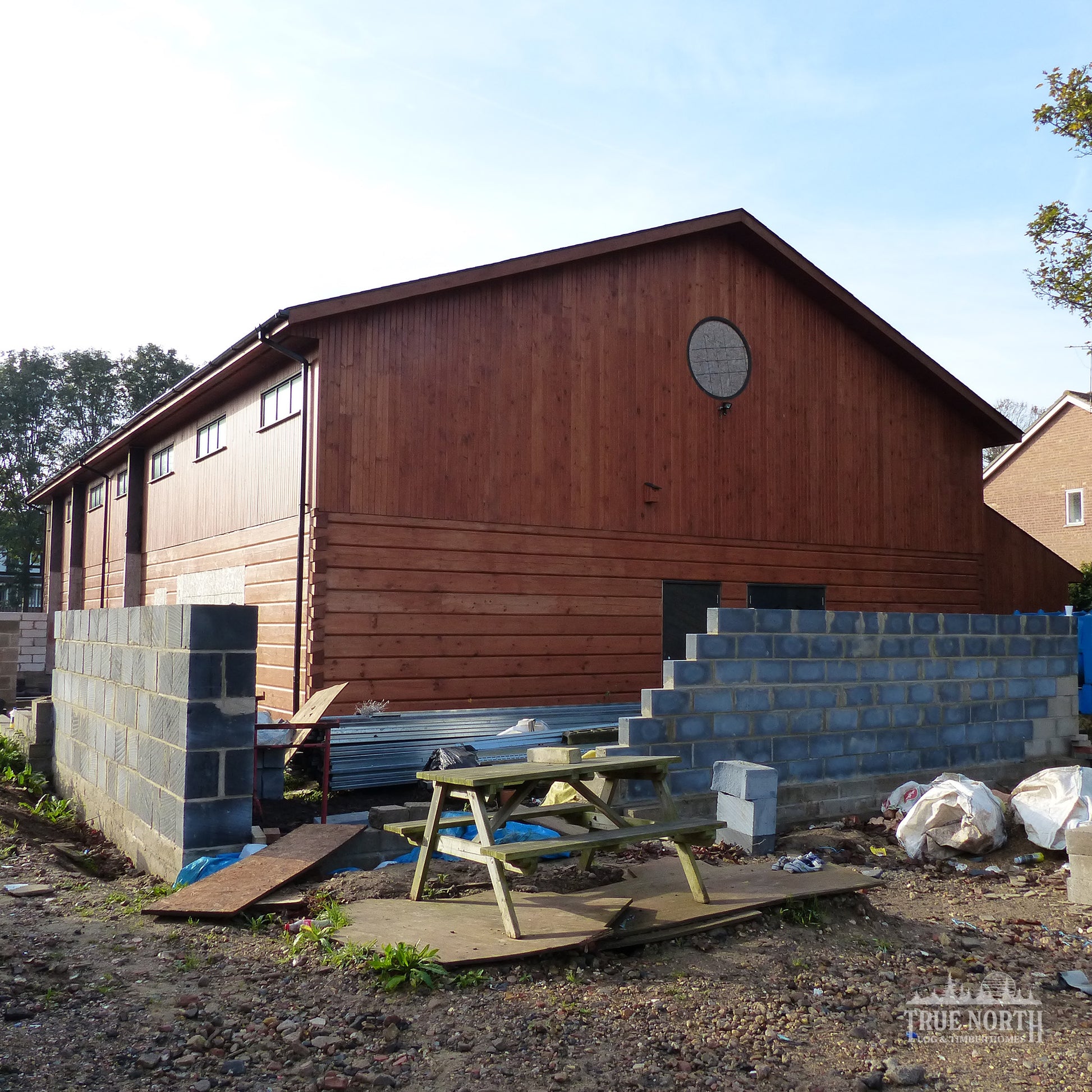 District Scout Centre by True North Log Homes showcasing a precision-engineered Canadian log community building - Main entrance under construction