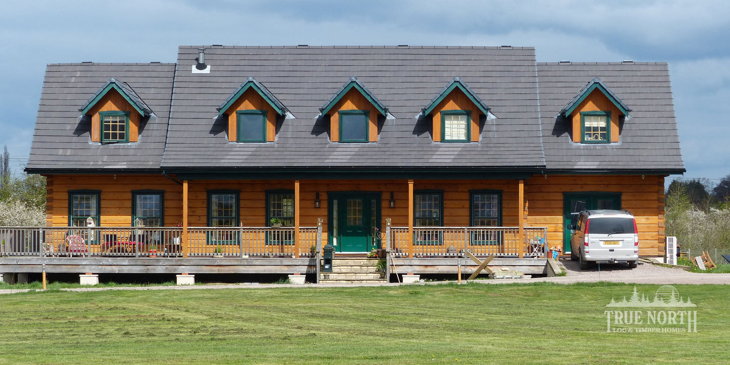 Louisburg traditional Canadian log home designed for family living in Derbyshire